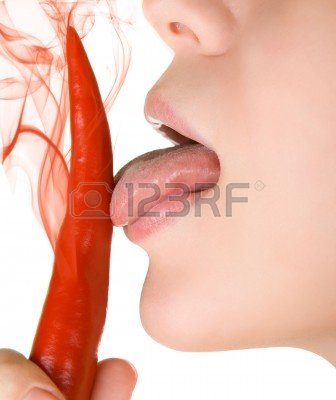 5637279-girl-close-up-licking-chili-pepper-isolated-on-white.jpg