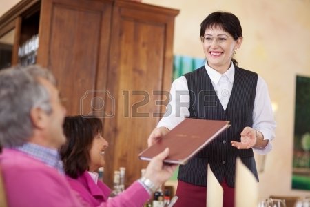 21217860-cheerful-smiling-waitress-passing-the-menu-to-guest.jpg