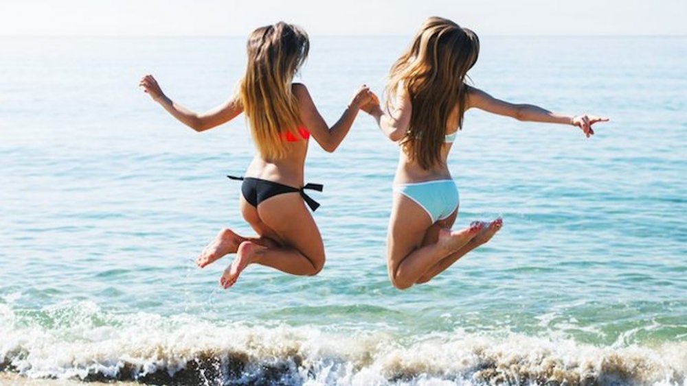 girls-jumping-beach.jpg